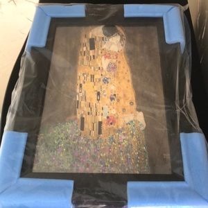 Print of Klimt’s “The Kiss” in black wood frame